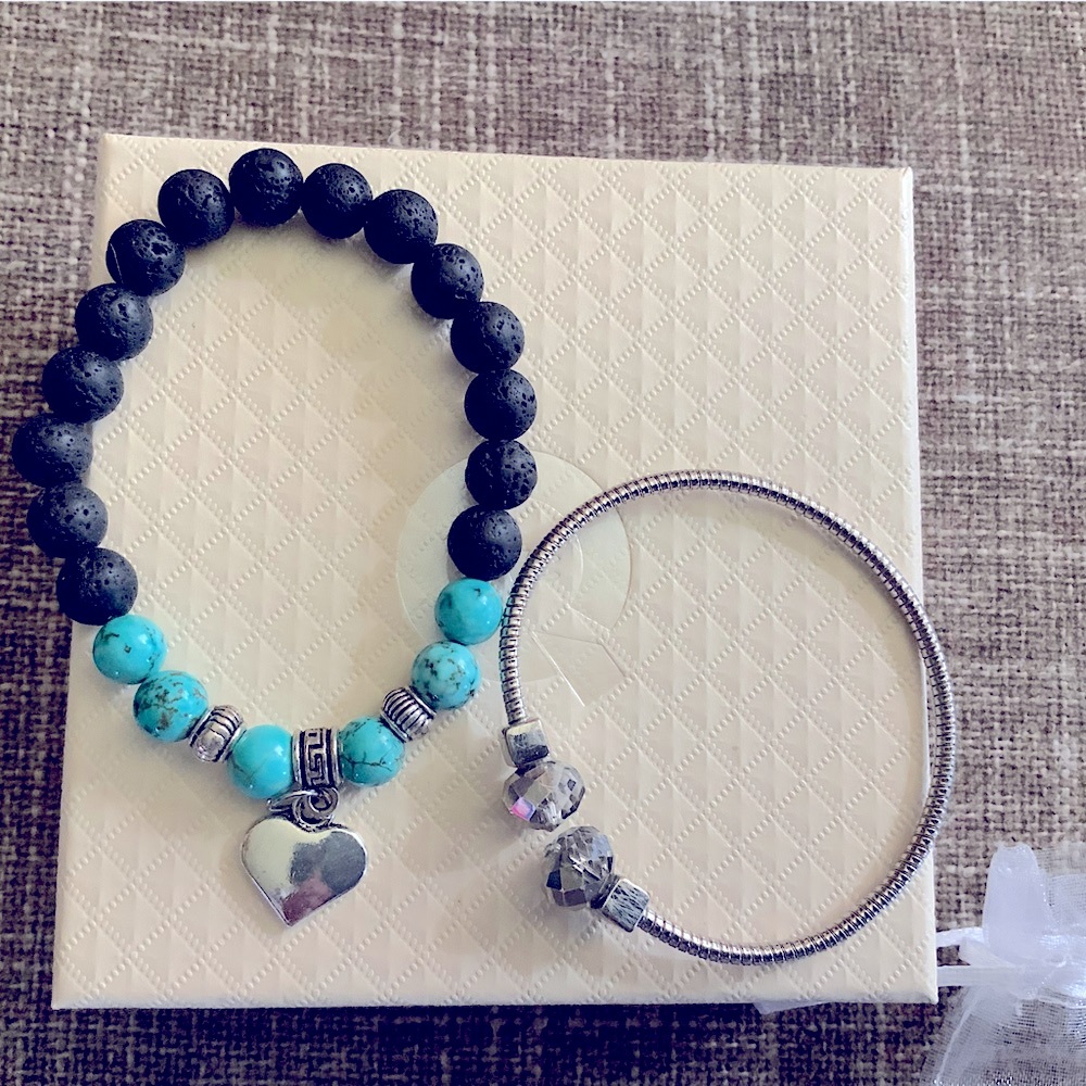 2 beautiful bracelets from QVC.  One is stretchy and the other just pulls apart.